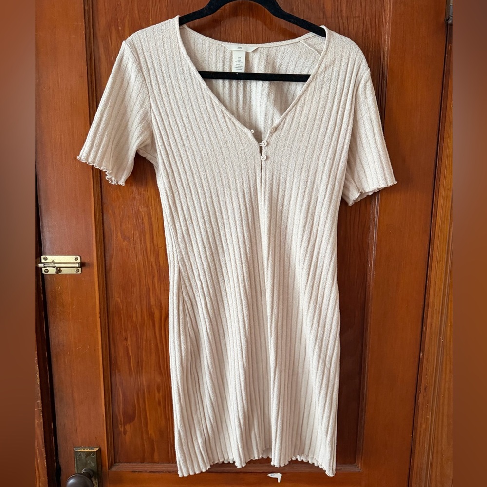 Tan dress with scalloped hem